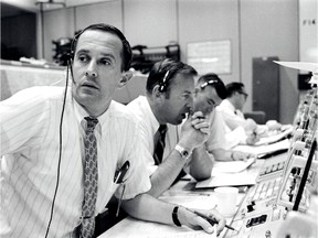 Charles Duke, left, was the capsule communicator for the Apollo 11 mission.