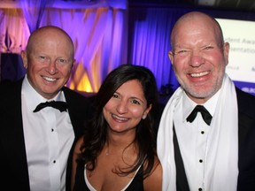 BEST IN BIZ: Co-chair Bill Weymark and Laureate selections sponsor Shelina Esmail of PFM Executive Search offered congratulations to Lululemon Athletica founder Chip Wilson on his induction into B.C.'s Business Hall of Fame. Photo: Fred Lee.