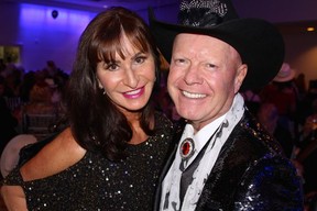 Rotary president Larry Thompson and Diane Dupuis were among a well dressed and well heeled crowd that helped rustle up $140,000 for local and international charities. Photo: Fred Lee.