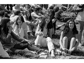 Music fans soak up the sun and good vibes at the Aldergrove Beach Rock Festival, May 17-19, 1969. The woman with the cigarette is Phyllis Taylor, to the right is Jocelyn Lilly. Vladimir Keremidschieff photo.