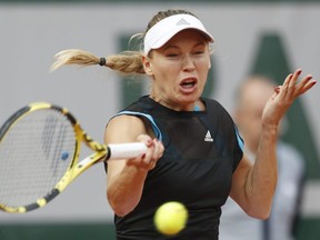 Denmark's Caroline Wozniacki plays a shot against Russia's Veronika Kudermetova during their first round French Open match at the Roland Garros stadium in Paris, Monday, May 27, 2019.