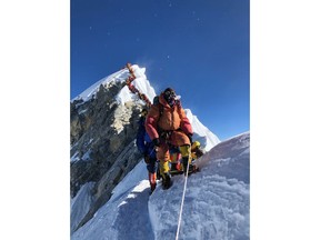 A queue of climbers on the Hillary Step of Mount Everest is shown in a May 22, 2019 handout photo.