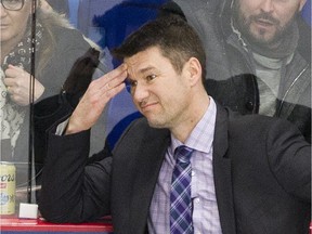 Vancouver Giants head coach Michael Dyck behind the bench as the Giants play the Prince George Cougars in a regular-season WHL game.