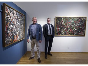 David, left, and Robert Heffel are flanked by the monumental Jean Paul Riopelle paintings Carnaval II and Incandescence at the Heffel Gallery at Granville and 7th.