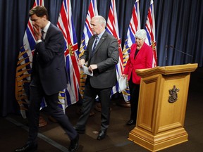 Premier John Horgan is joined by Finance Minister Carole James and Attorney General David Eby after announcing a decision to move forward with the public inquiry in light of recent findings on money laundering in the province.