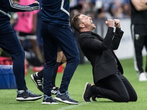 Vancouver Whitecaps head coach Marc Dos Santos celebrates after Vancouver defeated the Portland Timbers 1-0 in an MLS game in Vancouver on Friday May 10. The Caps will try to keep a good thing going when they host Atlanta United Wednesday night.