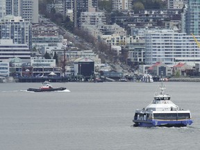 The province announced Tuesday it would conduct a feasibility study this summer of building a rapid transit crossing to the North Shore. Pictured is the SeaBus ferry crossing the Burrard Inlet.