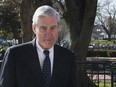 In this March 24, 2019 photo, Special Counsel Robert Mueller walks past the White House, after attending St. John's Episcopal Church for morning services, in Washington. Mueller will make his first public statement on the probe on Wednesday, May 29.