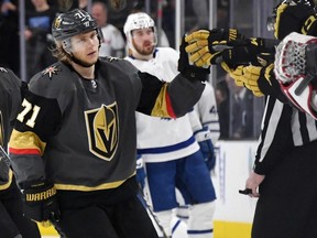 William Karlsson of the Vegas Golden Knights celebrates with teammates on the bench after scoring a third-period goal against the Toronto Maple Leafs during their game at T-Mobile Arena on February 14, 2019 in Las Vegas, Nevada.