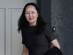 Huawei Technologies CFO Meng Wanzhou leaves her home on May 7 in Vancouver.