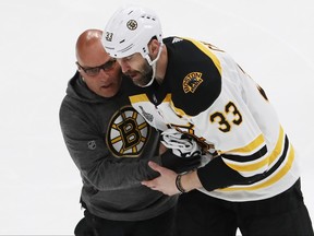 Boston Bruins Zdeno Chara is attended to after being injured during the game against the St. Louis Blues in Game 4 of the 2019 NHL Stanley Cup Final at Enterprise Center on June 3, 2019 in St Louis, Miss. (Jamie Squire/Getty Images)
