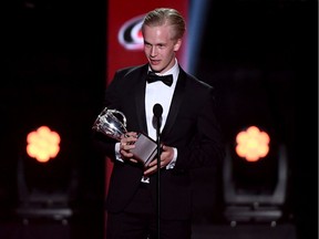 Elias Pettersson of the Vancouver Canucks accepts the Calder Memorial Trophy awarded to the player selected as the most proficient in his first year of competition during the 2019 NHL Awards at the Mandalay Bay Events Center on June 19, 2019 in Las Vegas, Nevada.