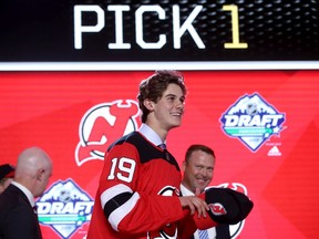Jack Hughes smiles after being selected first overall by the New Jersey Devils during the first round of the 2019 NHL Draft at Rogers Arena on June 21, 2019 in Vancouver.