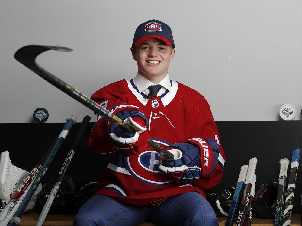 Caufield returns home as NHL 1st round pick, visits hockey camp