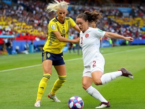 PARIS, FRANCE - JUNE 24: Allysha Chapman of Canada is challenged by Sofia Jakobsson of Sweden during the 2019 FIFA Women's World Cup France Round Of 16 match between Sweden and Canada at Parc des Princes on June 24, 2019 in Paris, France.