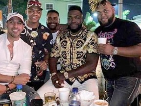 Big Papi, second from right, and pals celebrate hours before the legend was shot outside a club in Santo Domingo.
