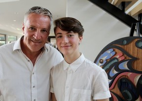 Accompanied by his dad Andrew, past camper Alex Windross shared with guests the transformative time he had at CampOUT. Photo: Fred Lee.