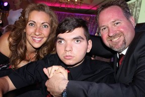 CAMP FAMILY: Cindy and Jim Lanctot spoke of the positive effects the Zajac Ranch had on their 16 year-old non-verbal son Jordan who lives with lissencephaly, a rare brain disorder. Photo: Fred Lee.