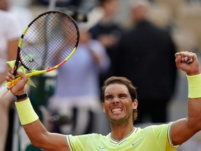Spain's Rafael Nadal celebrates after winning against Japan's Kei Nishikori at the end of their men's singles quarter-final match on day ten of The Roland Garros 2019 French Open tennis tournament in Paris on June 4, 2019.