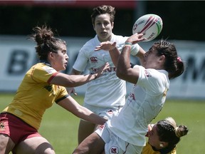 Canada's Bianca Farella is tackled during a World Rugby Sevens Series match against Spain in Biarritz, France on June 15, 2019.