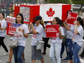 Environmentalists carry a mock container of garbage from Canada as they protest at the Philippine Senate to demand the Canadian government speed up the removal of several containers of garbage that were shipped to the country six years ago Friday, May 24, 2019 in suburban Pasay city, south of Manila, Philippines. The Philippines is slowly normalizing diplomatic relations with Canada now that the trash tiff of 2019 has come to a close.THE CANADIAN PRESS/AP/Bullit Marquez