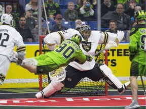 Saskatchewan Rush forward Ben McIntosh shoots the ball at Vancouver Warriors' goalie Eric Penney during National Lacrosse League action at the SaskTel Centre in Saskatoon on March 30, 2019.