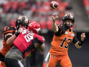 B.C. Lions quarterback Mike Reilly, right, will make his first regular-season appearance in Edmonton tonight at Commonwealth Stadium to face his former CFL team.