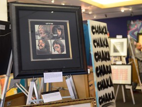 Paul McCartney's signed copy of the 1970 Beatles release "Let It be" is displayed amid preparations at Julien's Auction House in Beverly Hills, California.