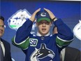 CP-Web. Vancouver Canucks select Vasily Podkolzin during the first round NHL draft at Rogers Arena in Vancouver, Friday, June, 21, 2019.