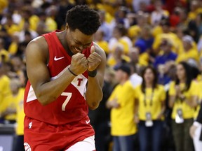 Raps’ Kyle Lowry wears the look of pure satisfaction late in Game 6 of the NBA Finals against the Warriors in Oakland on Thursday night. Lowry was perhaps the happiest man on earth following his team’s championship-clinching win. (GETTY IMAGES)