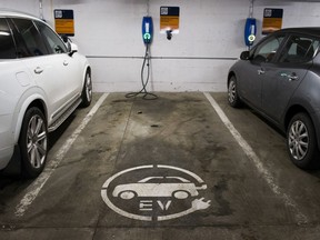 An electric-vehicle charging spot in a University of B.C. parking lot: The B.C. government is scaling back its EV incentive program.