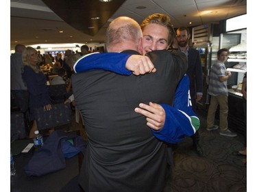 Nils Hoglander, seen here hugging dad Anders Hoglander, is picked in the second round by the Vancouver Canucks in Day 2 of the 2019 NHL Draft at Rogers Arena, Saturday, June 22.