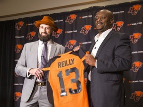 Second-year Lions general manager Ed Hervey (right) put into motion the biggest change in the franchise’s culture by bring back to the West Coast quarterback Mike Reilly with a four-year, $2.9-million contract.