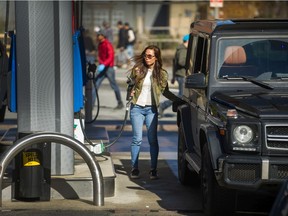 People refuel their vehicles as the price of fuel goes up and people enjoy the warmer weather in Vancouver.