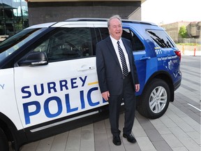 Mayor Doug McCallum with a prototype of a new Surrey police vehicle after presenting his state-of- the-city address at city hall on May 6.