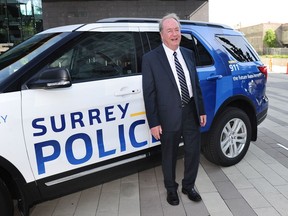 Mayor Doug McCallum with a prototype of a new Surrey Police vehicle.