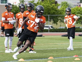 Jevon Cottoy of the B.C. Lions runs with the football during the CFL team's training camp at Hillside Stadium in Kamloops. The Lions say Cottoy was the biggest surprise at camp.