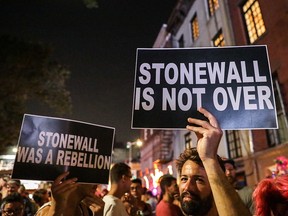 People participate during the 50th Anniversary of the Stonewall Uprising in Manhattan in New York City, June 28, 2019. (REUTERS/Jeenah Moon)
