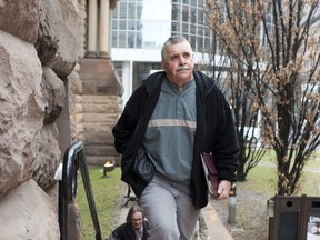 Convicted pedophile and former Maple Leaf Gardens usher Gordon Stuckless arrives at the Old City Hall courts in Toronto in 2014.