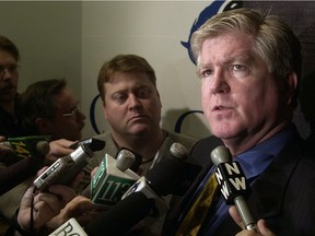 Burke speaks with the Vancouver media in March 2002.