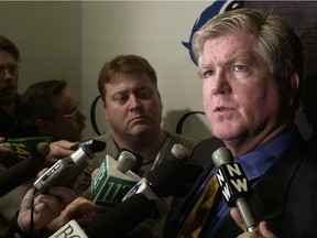 Burke speaks with the Vancouver media in March 2002.