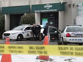 RCMP at the scene of a murder on Viking Way in Richmond in January, 2017.