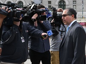 Keith Raniere's lawyer, Marc Agnifilo, speaks to the press as he arrives at Brooklyn Federal Court on May 7, 2019, in New York. (TIMOTHY A. CLARY/AFP/Getty Images)