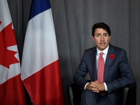 Canadian Prime Minister Justin Trudeau attends a bilateral on the sideline of the international ceremony on Juno Beach in Courseulles-sur-Mer, Normandy, northwestern France, on June 6, 2019, as part of D-Day commemorations marking the 75th anniversary of the World War II Allied landings in Normandy.