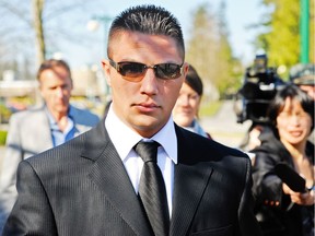 Jarrod Bacon leaves B.C. provincial court in Surrey in 2009.