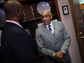 National Hockey League Hall of Famer Willie ORee (R) speaks with Sen. Tim Scott (R-SC) on Capitol Hill July 25, 2019 in Washington, DC. ORee, the first black player to compete in the National Hockey League, visited Capitol Hill following an announcement that he would receive the Congressional Gold Medal.