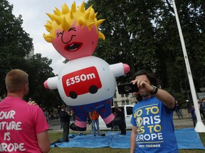 A giant inflatable blimp depicting Boris Johnson is seen ahead of anti-Brexit 'No to Boris, Yes to Europe' protest in London, July 20,2019. REUTERS/Simon Dawson