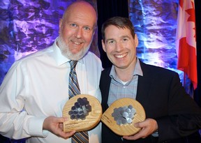 Displaying their hardware was ASTTBC Technology Awards honourees Scott Campbell, Chief Administrative Officer and Senior Principal of R.RF. Binnie & Associates and Brett Henkell, co-founder of Inventys. Photo: Fred Lee.