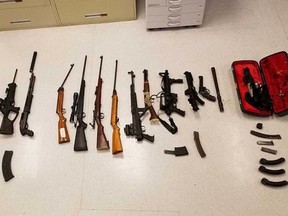 An assortment of weapons seized by Chase RCMP. Among them, an Americanized version of the AK-47, a Second World War-era submachine gun and a suitcase-enclosed gun that can be fired without being removed from the case.