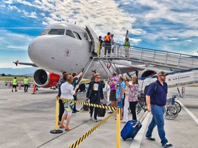 Passengers arrive in Kamloops on June 21, 2018, when the first non-stop Air Canada Rouge flight arrived from Toronto. Air Canada is running a weekly flight between the two cities every Thursday until the end of August.